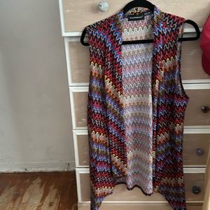 Multi colored vest in size XL